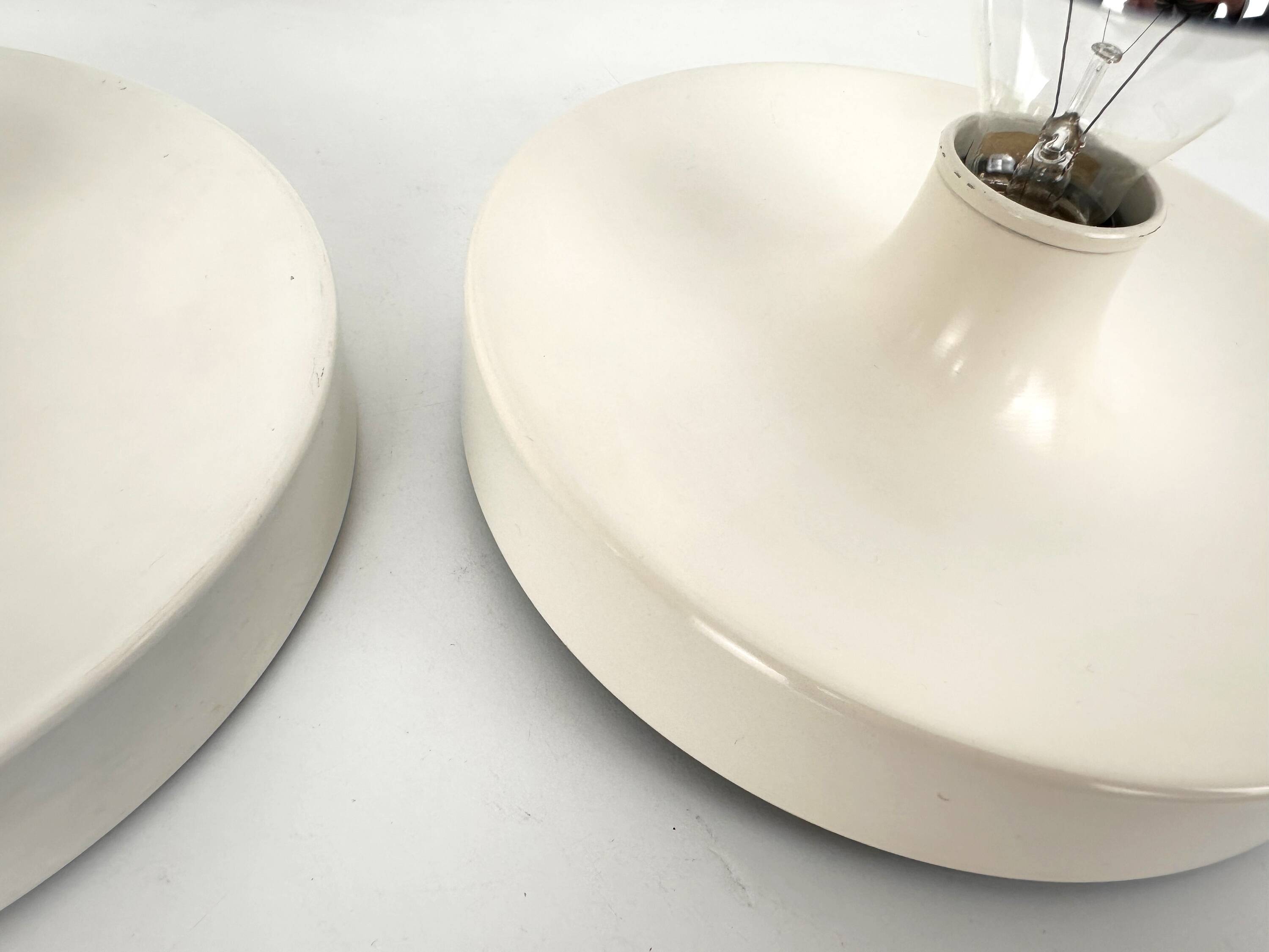 Pair of wall lights selected by Charlotte Perriand, Germany 1960