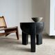 Black mango wood tripod side table with a semi-spherical top, height: 45 cm, diameter: 44 cm.