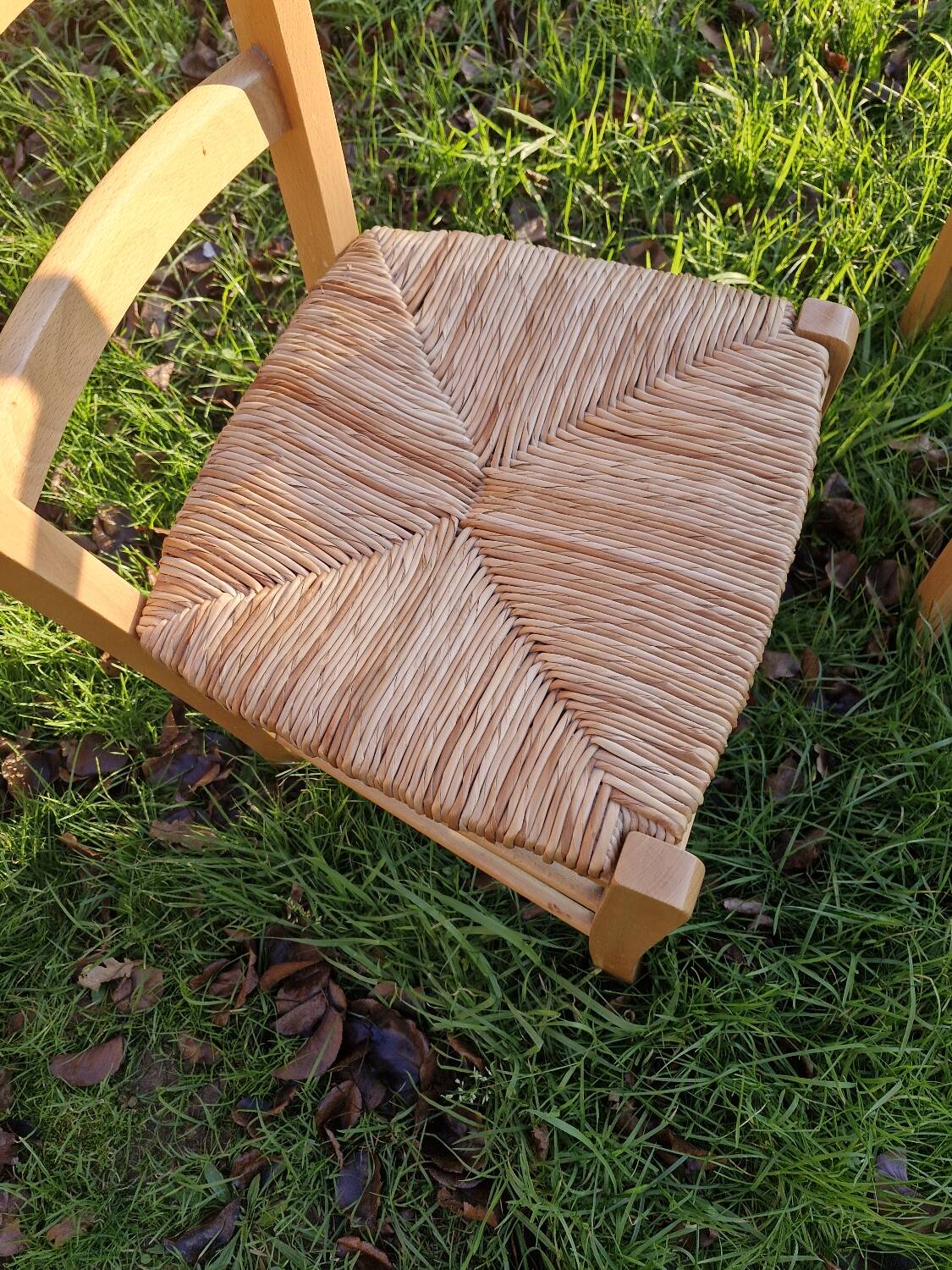 Pair of wooden and straw chairs