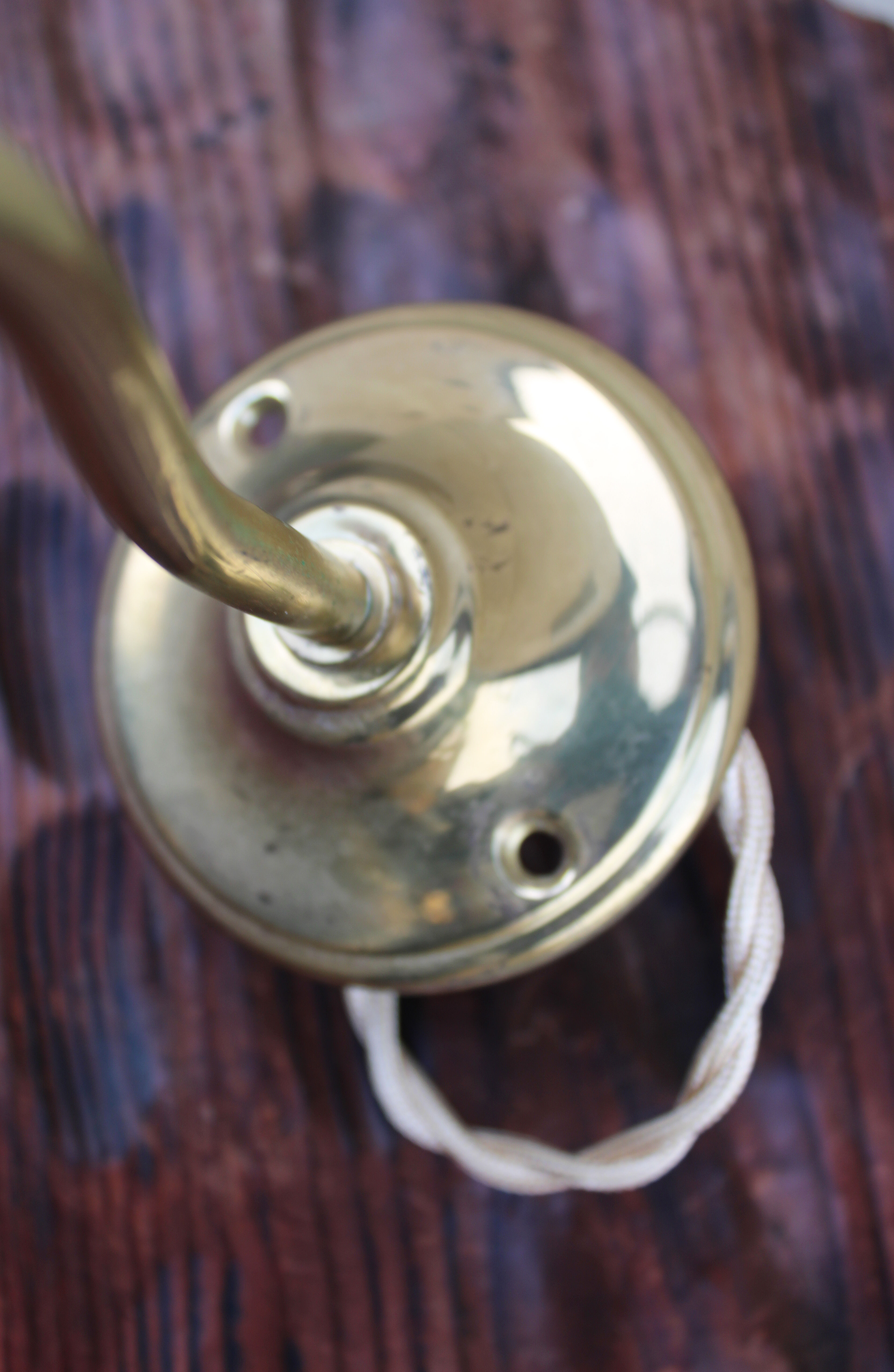 Brass and streaked glass sconce