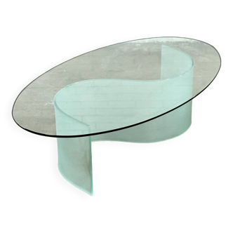 Oval glass coffee table with wave/s shape leg