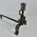 Pair of ironwork andirons in the style of Raymond Subes, circa 1940