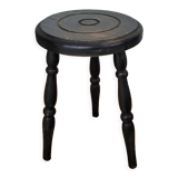 Black wooden tripod stool