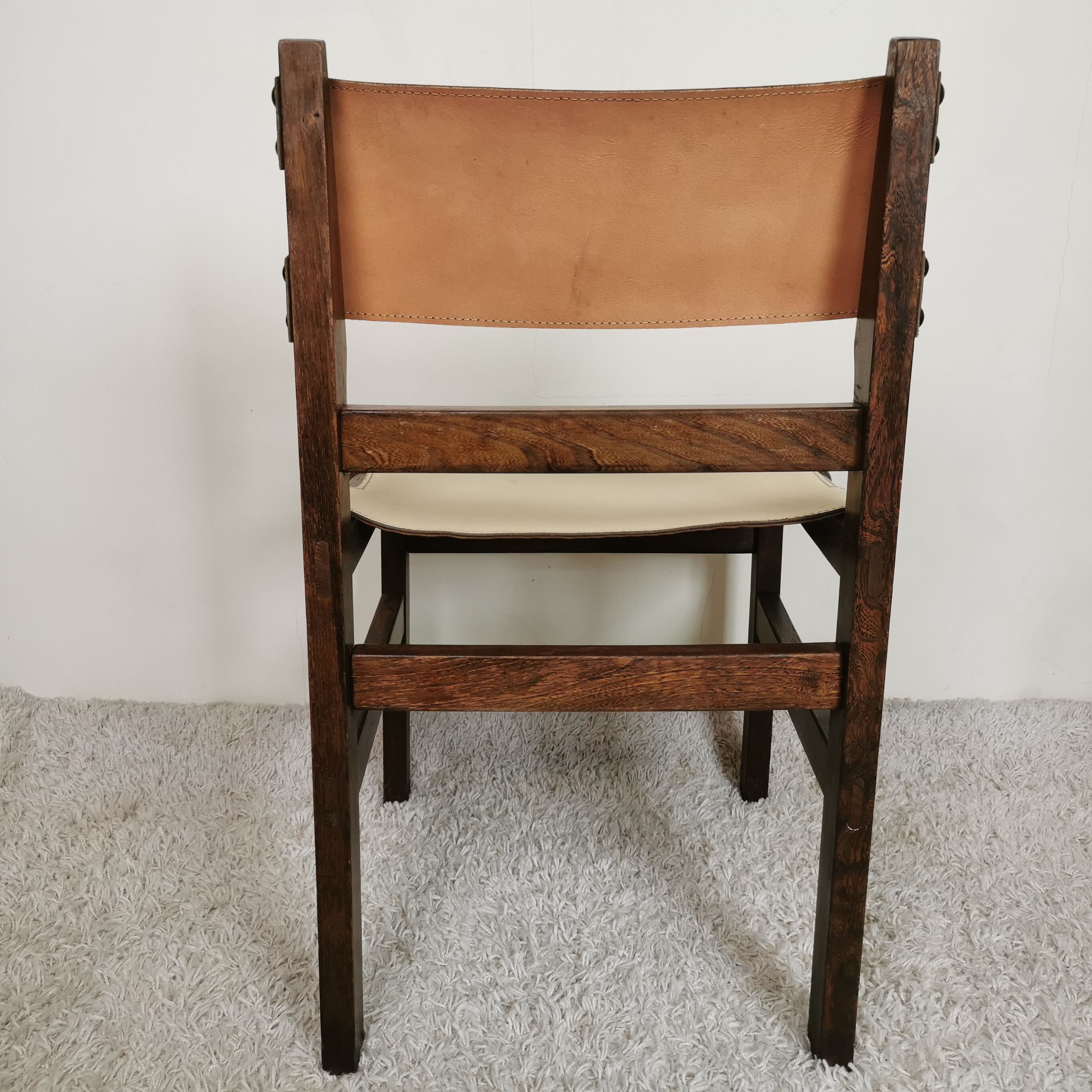 Series of 4 wooden and leather chairs