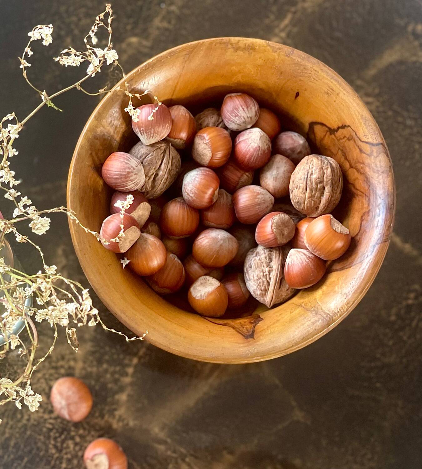 Empty pocket in olive wood