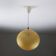 Amber speckled glass and gold aluminum globe