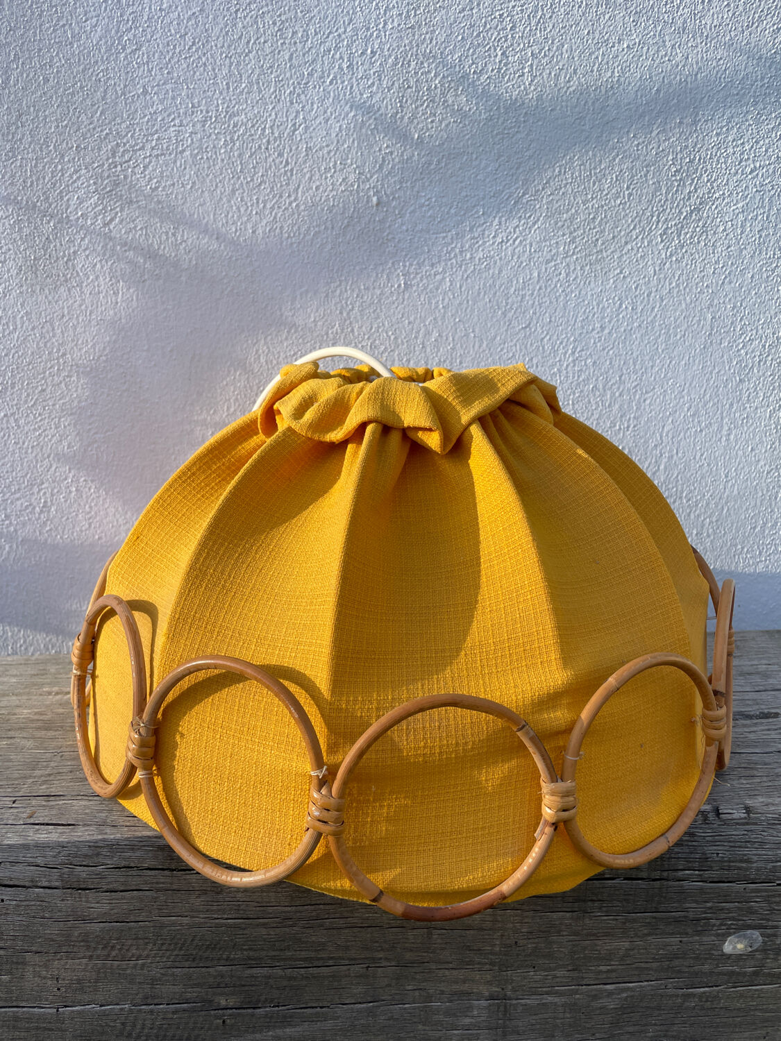 Wooden rattan and fabric suspension