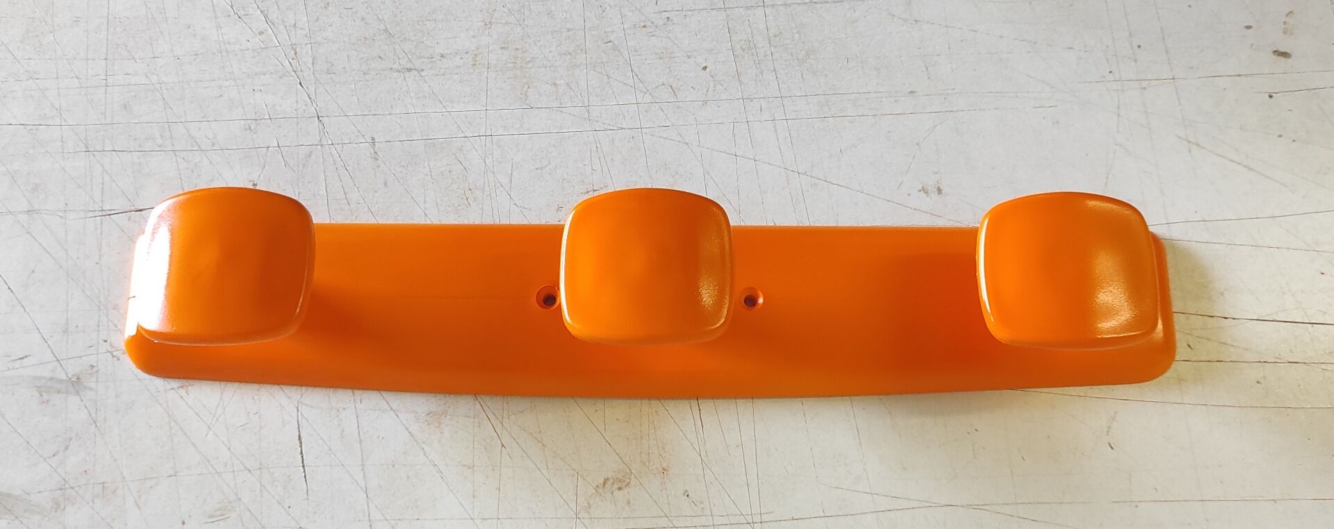 Orange wall coat rack by Syla - 1970s