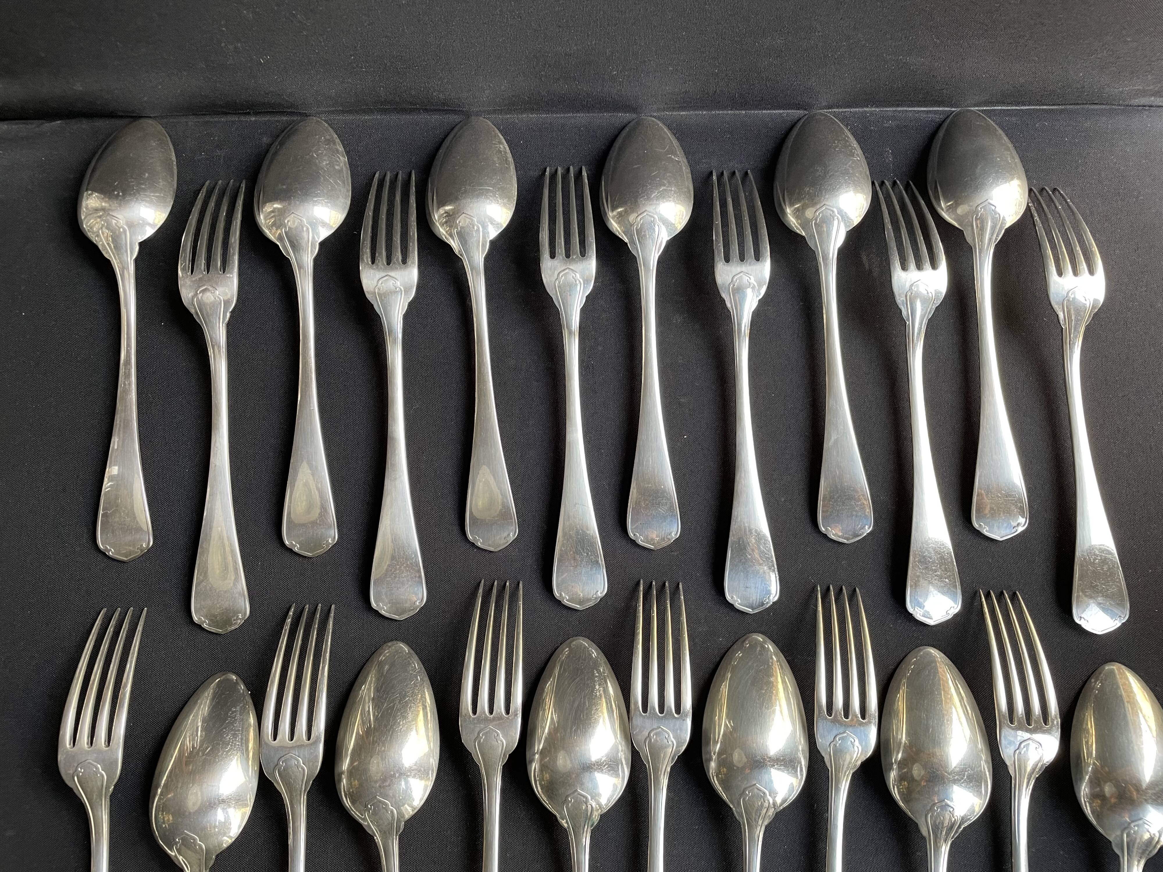 12 Christofle table forks and 12 spoons