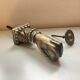 Antique bronze hand-shaped door knocker