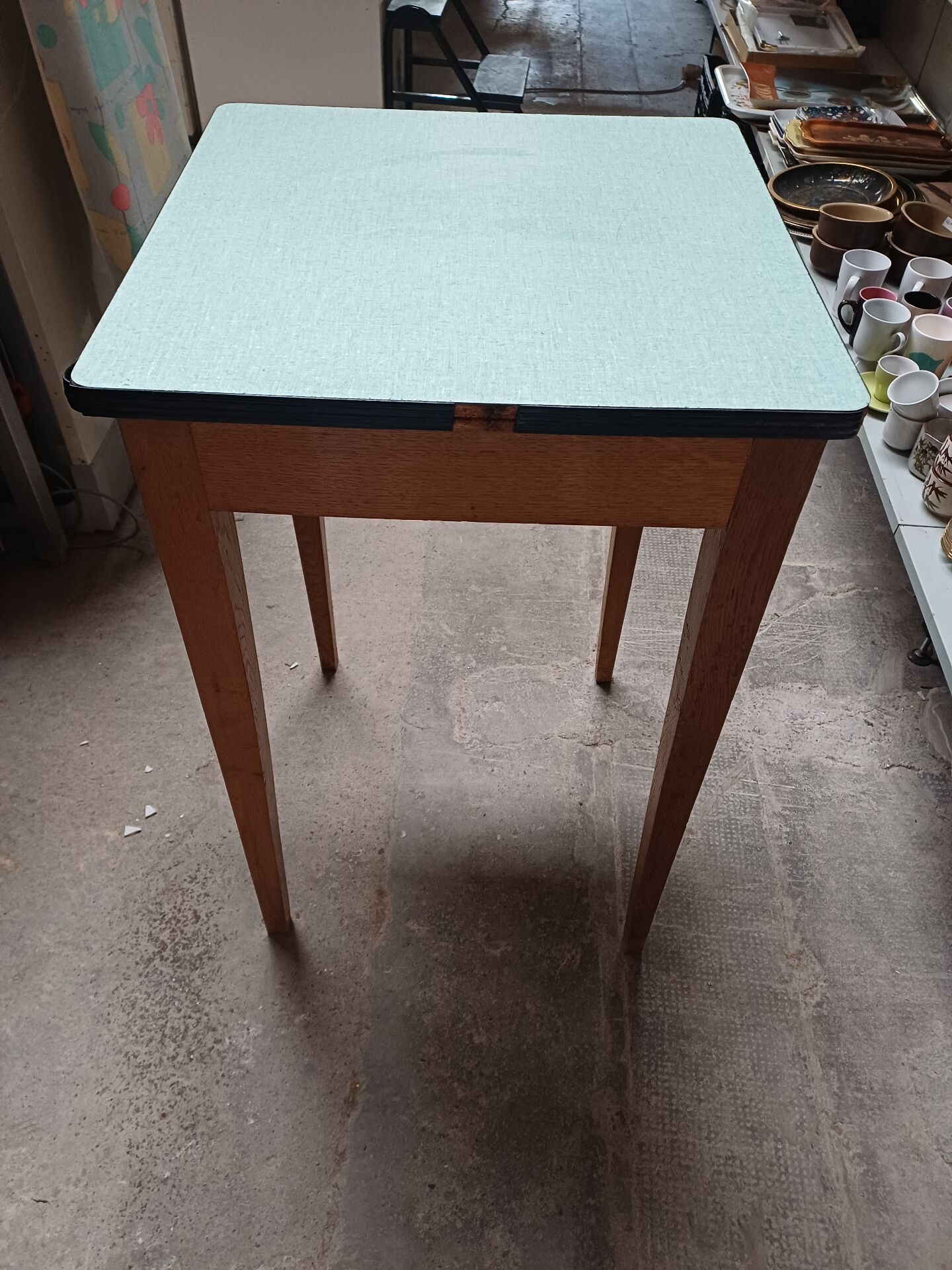 Formica table with tapered wooden legs + stool