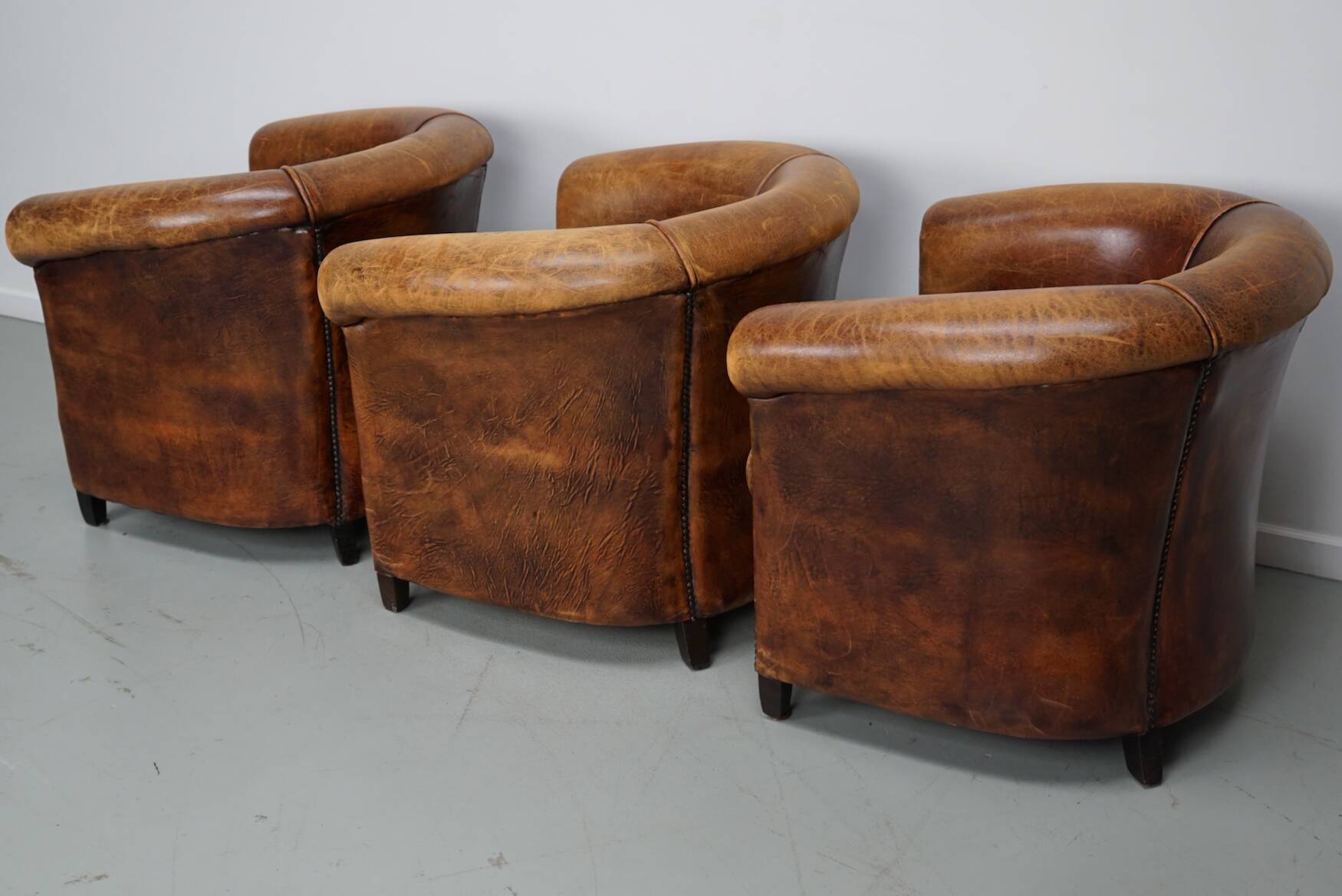 Fauteuils club vintage hollandais en cuir cognac, lot de trois