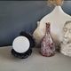 Vintage shell lamp in black porcelain with opaline globe.
