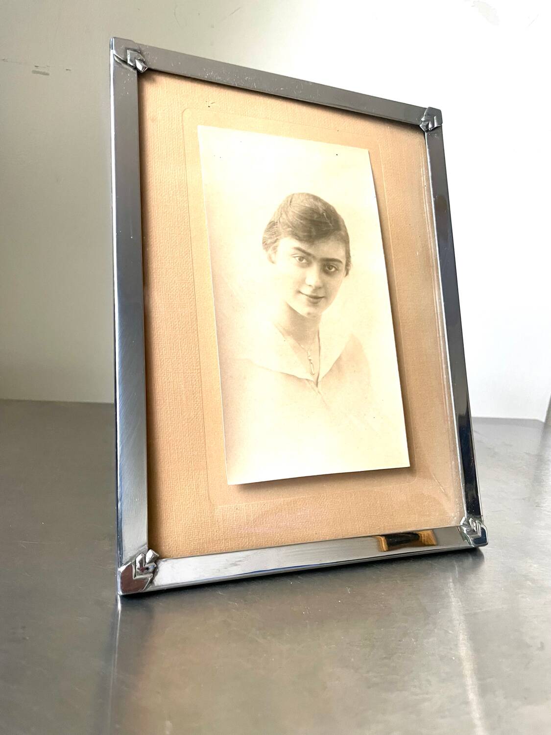 Art deco silver colored  metal frame  20.5  cm x 15.5 cm convex glass