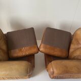 Pair of brown leather armchairs