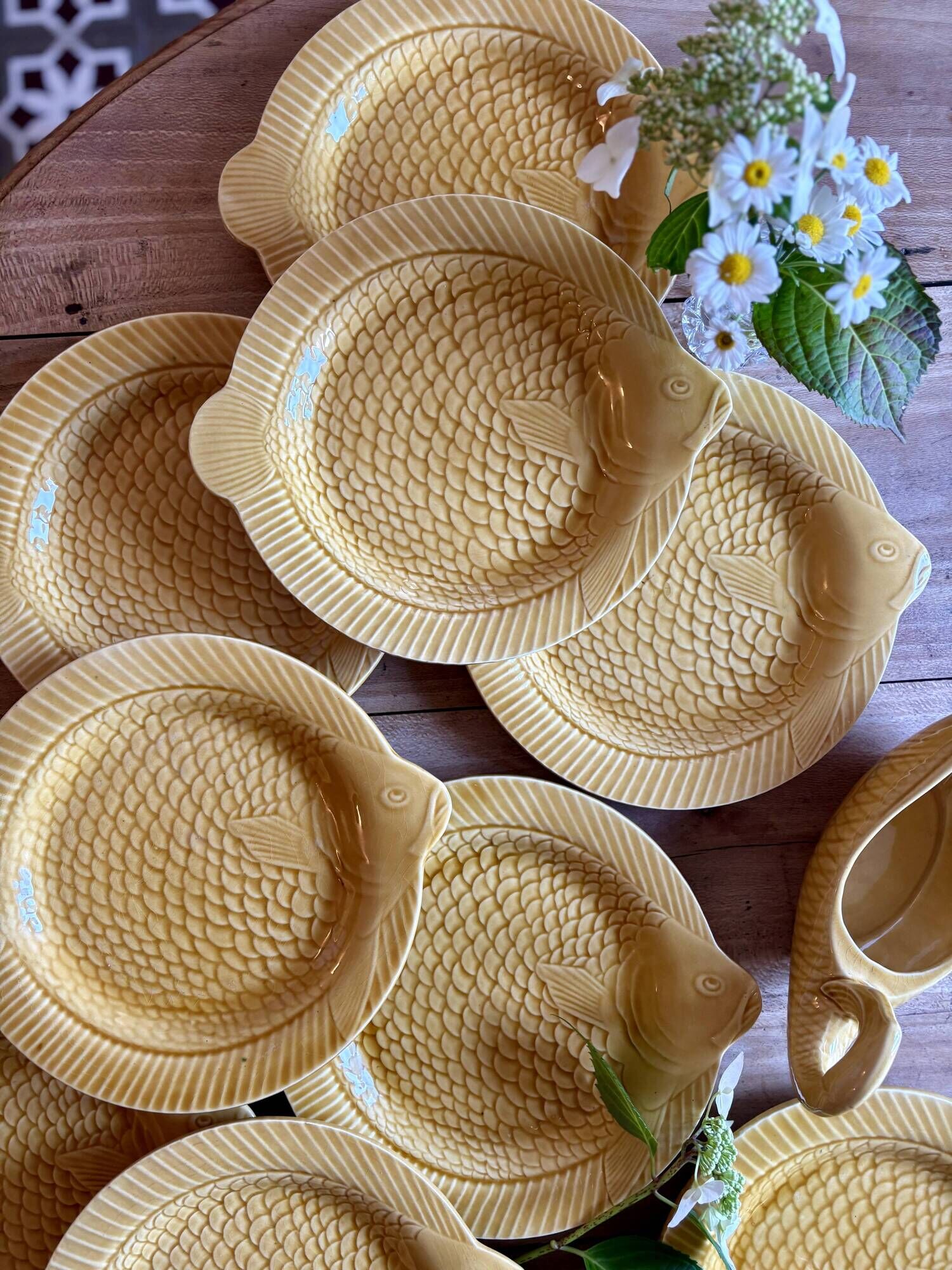 Set of 11 vintage Sarreguemines fish plates and sauceboat