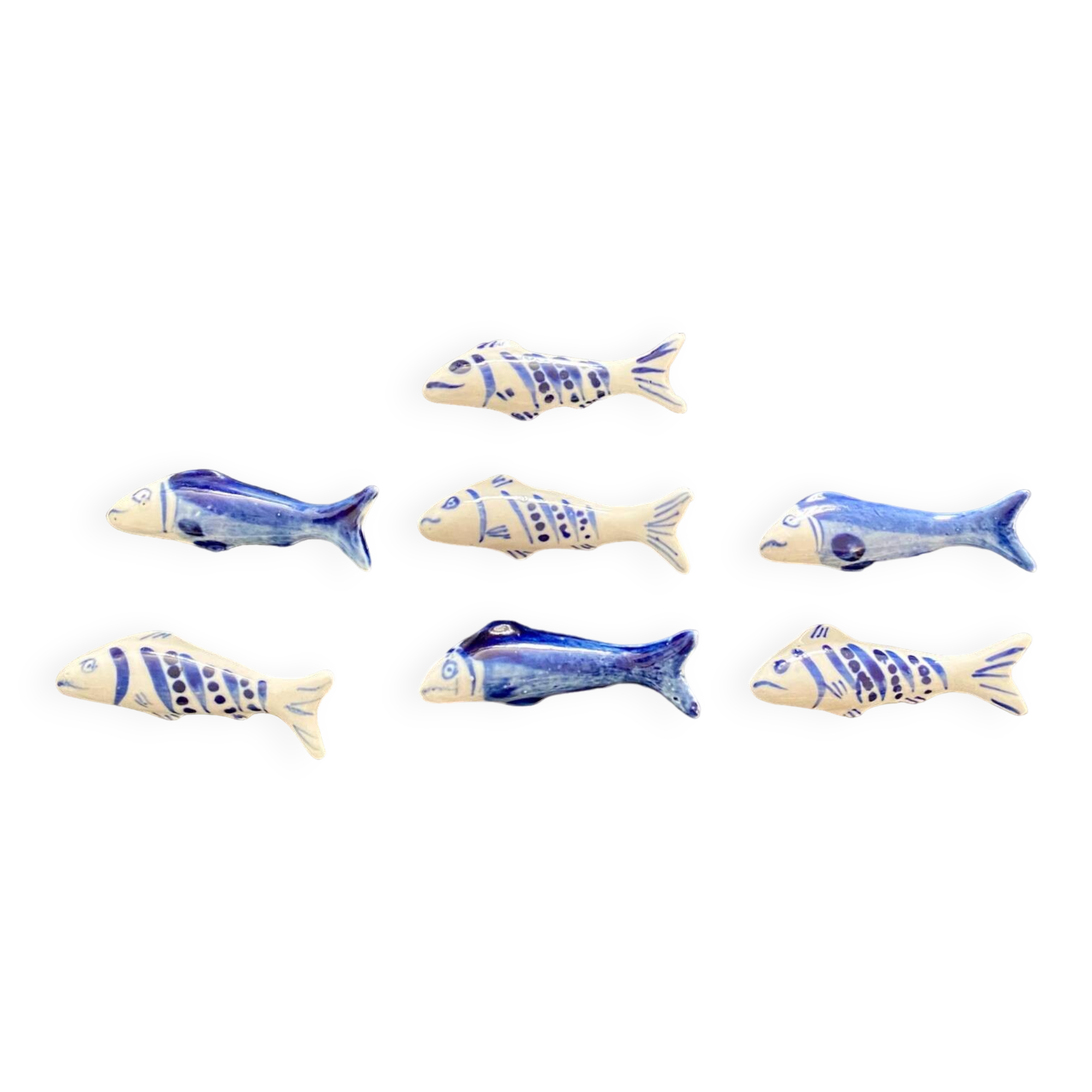 7 fish-shaped porcelain knife holders