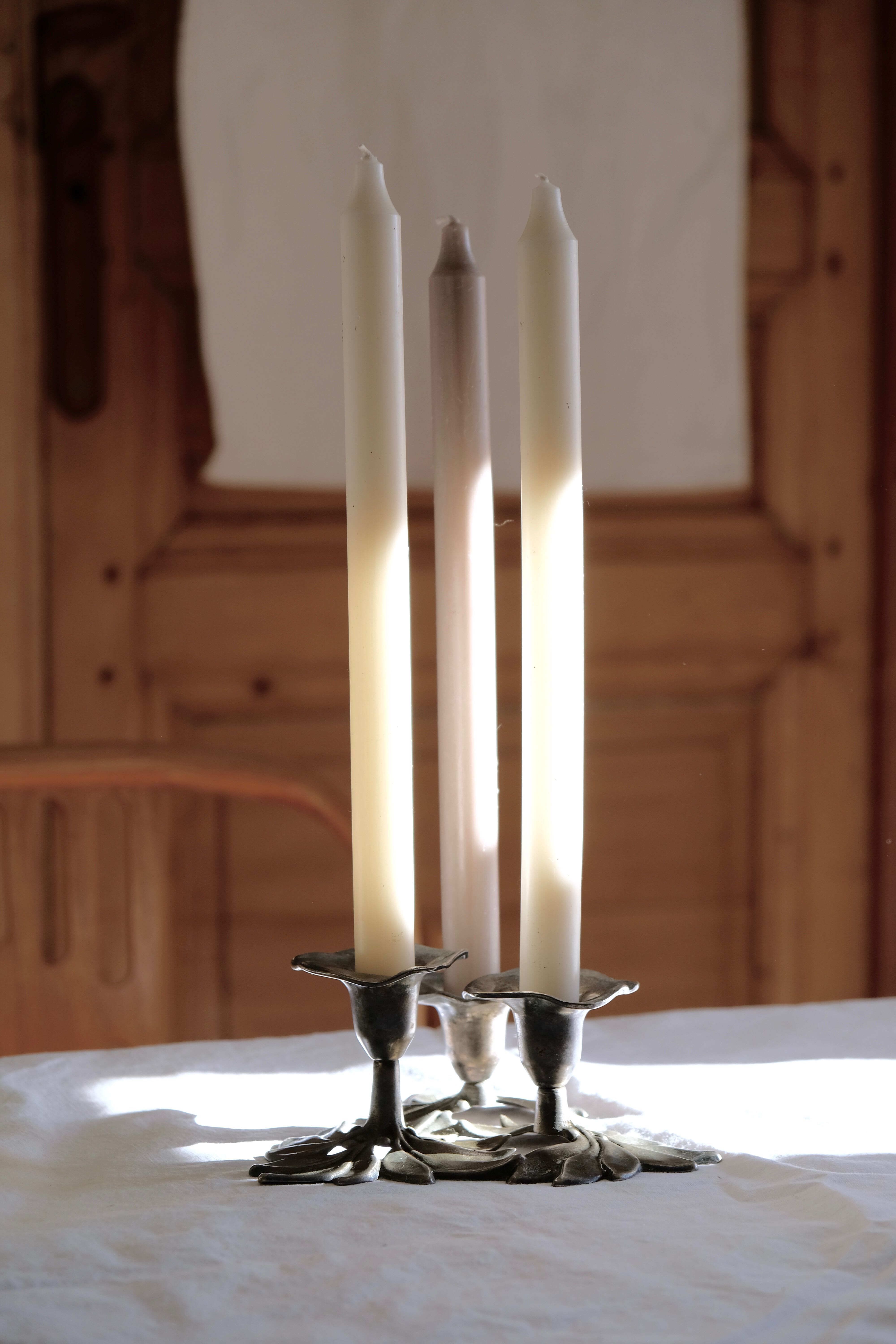 Three-flower pedestal 19th century candlestick