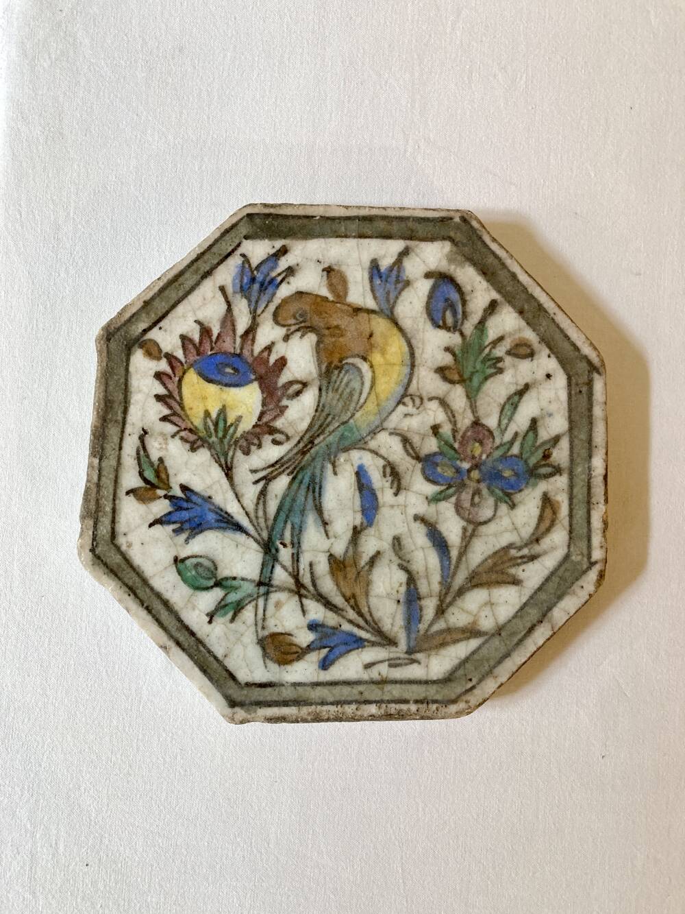 Ancient Persian tile in glazed earthenware