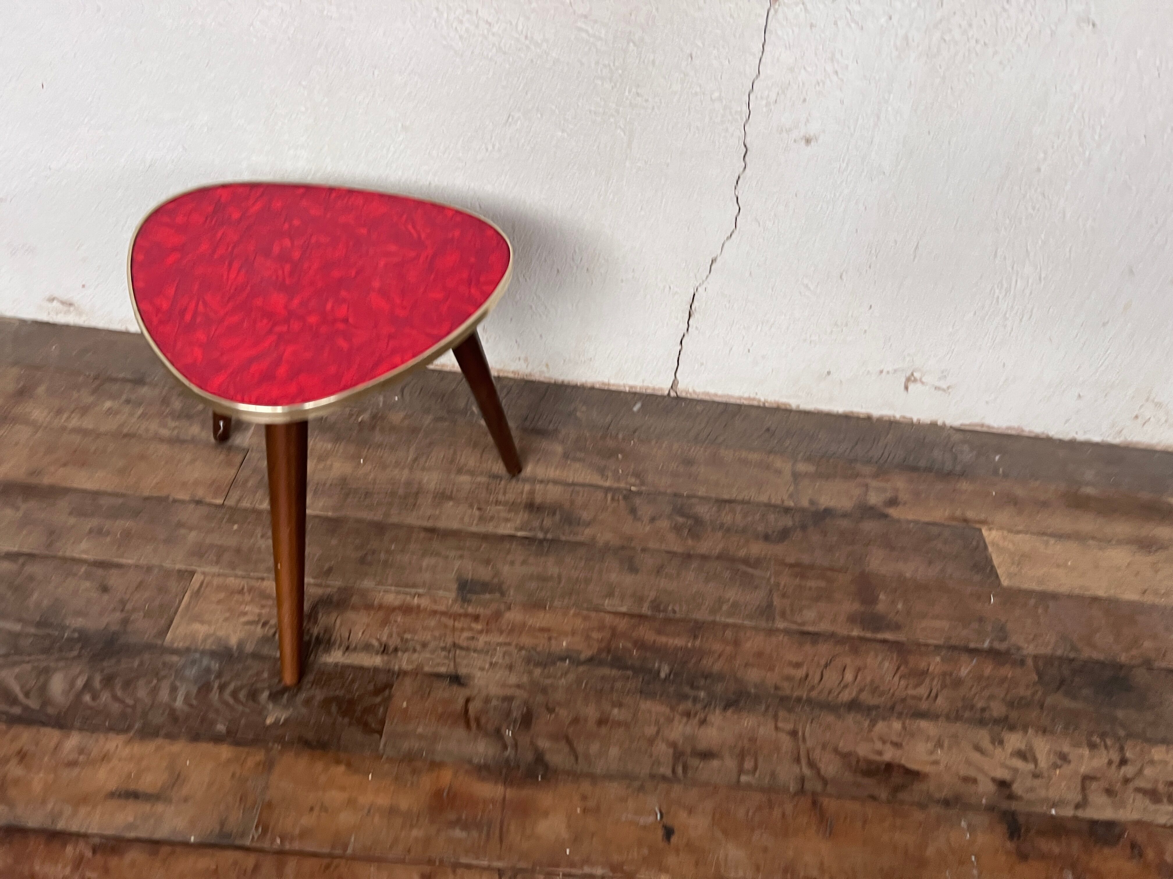 Triangular pedestal table small red table asymmetrical shape vintage tripod plant door