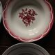 A set of 4 mismatched Art Deco red blue soup plates