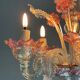 Small Venetian chandelier in colorless and red Murano glass, circa 1950