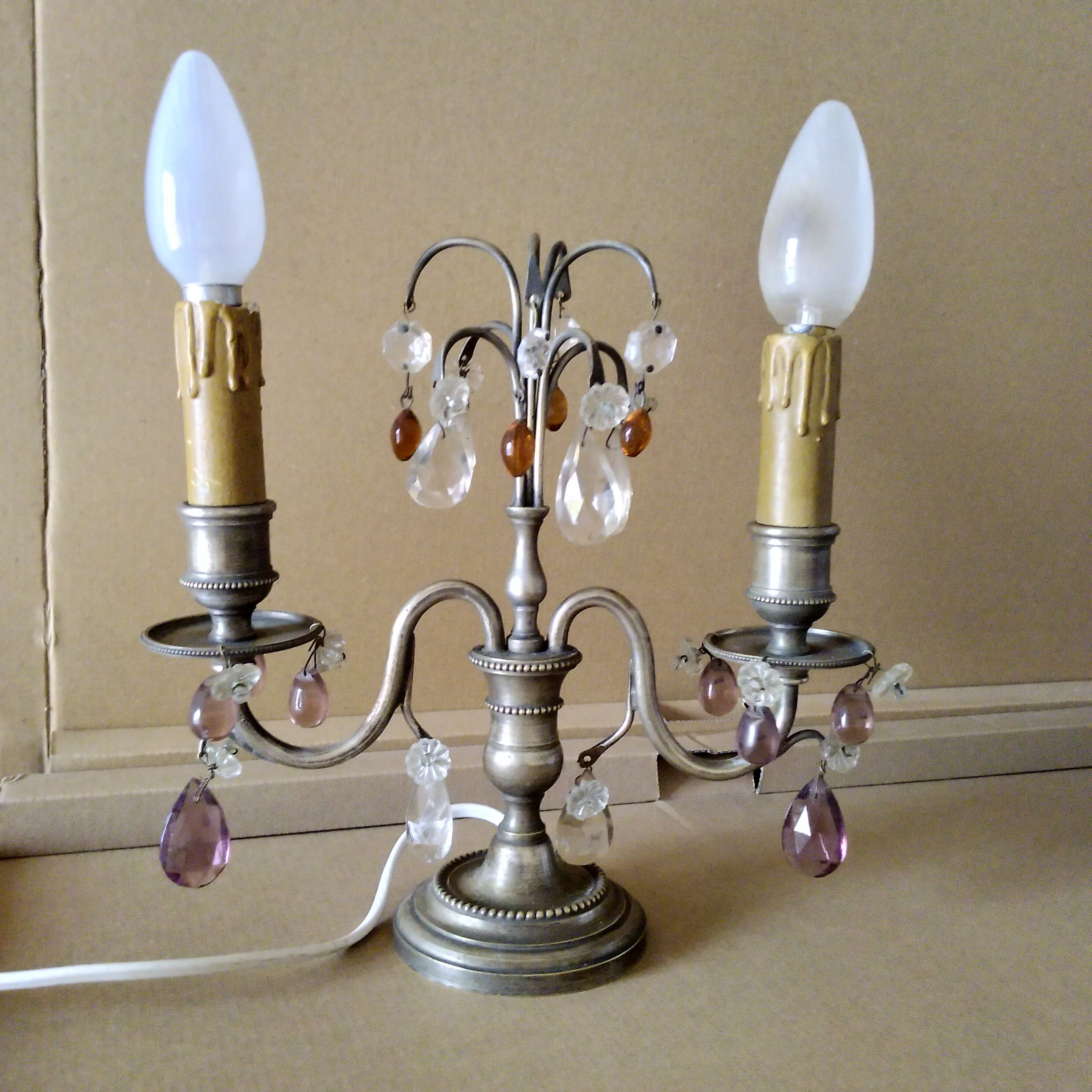 Pair of girandole lamps and silver metal