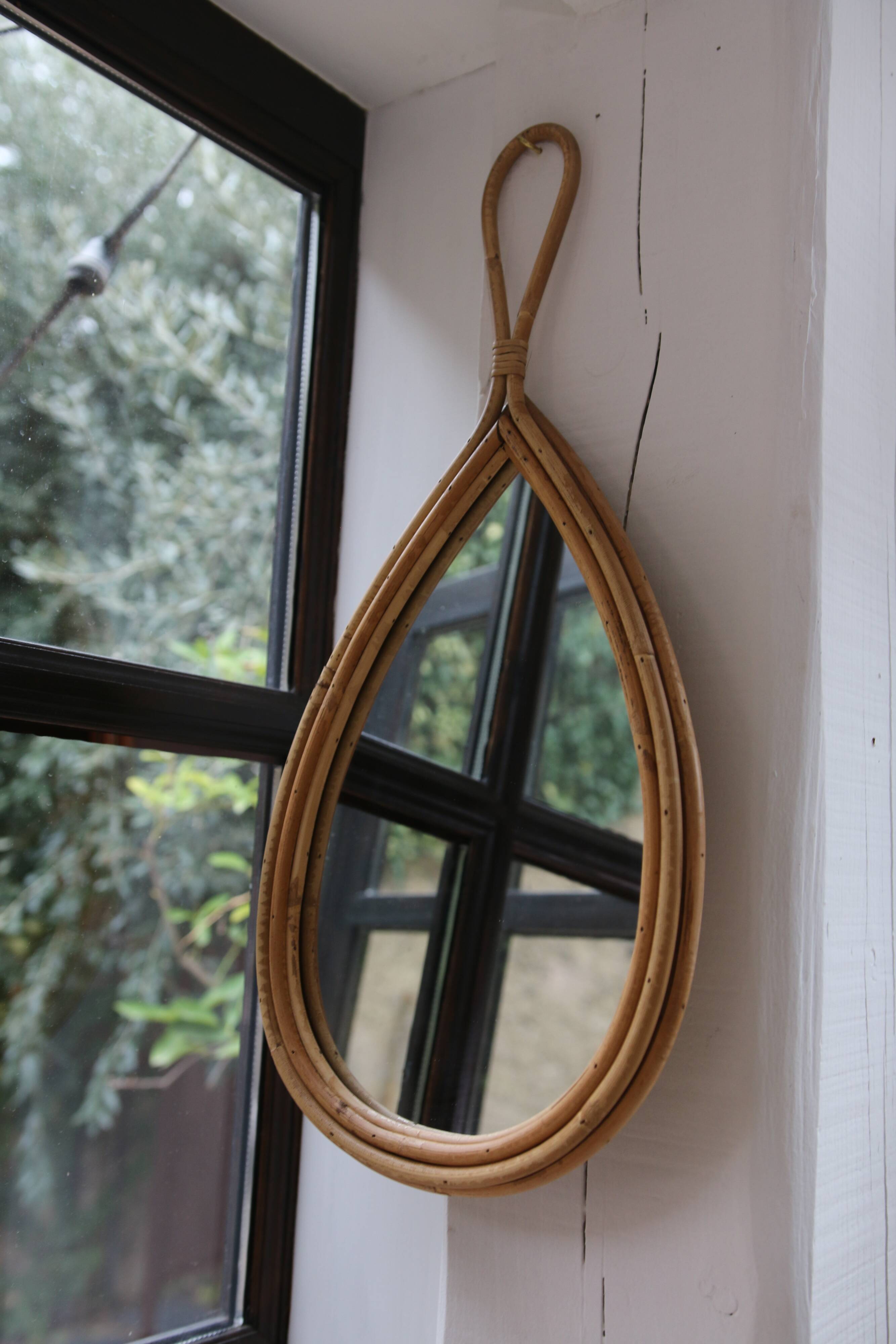 Vintage teardrop rattan mirror