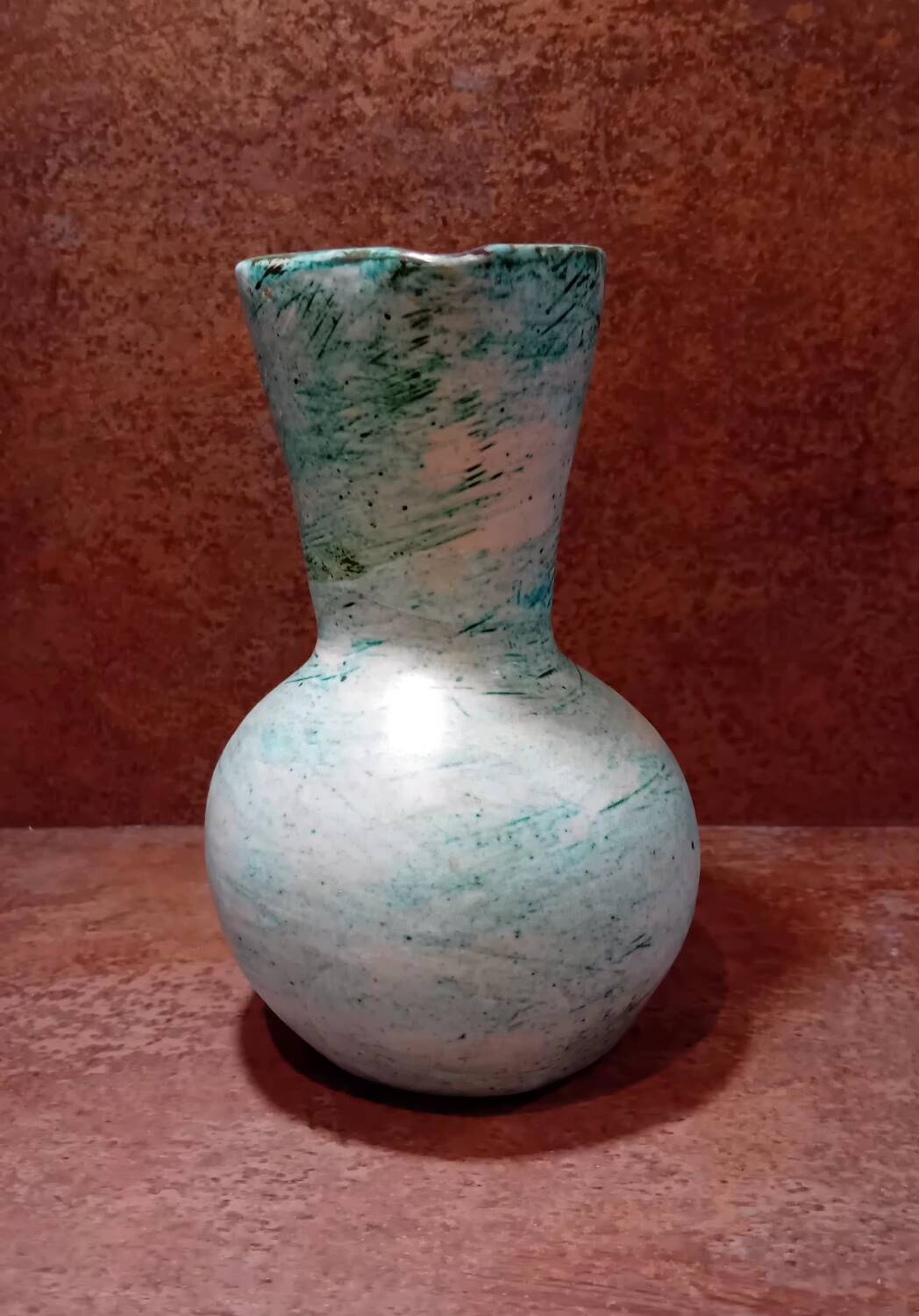 Turquoise ceramic pitcher vase