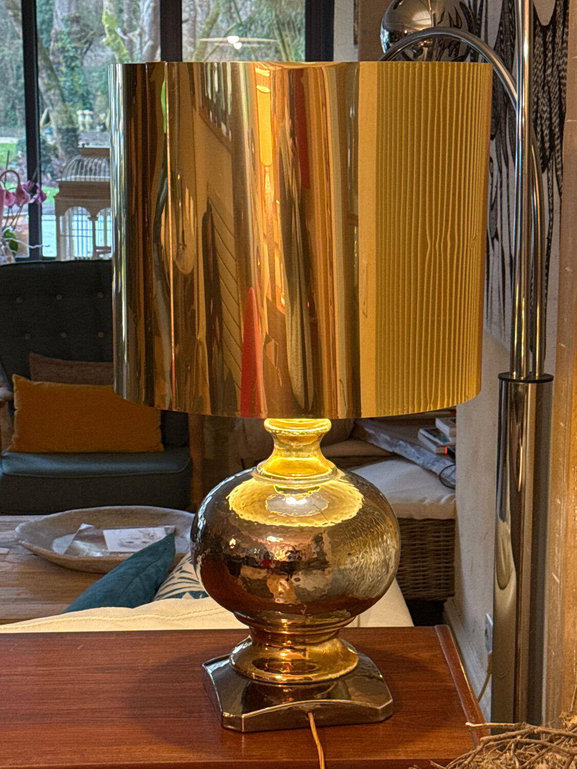 Beautiful ceramic base lamp with a golden metal shade.