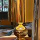 Beautiful ceramic base lamp with a golden metal shade.