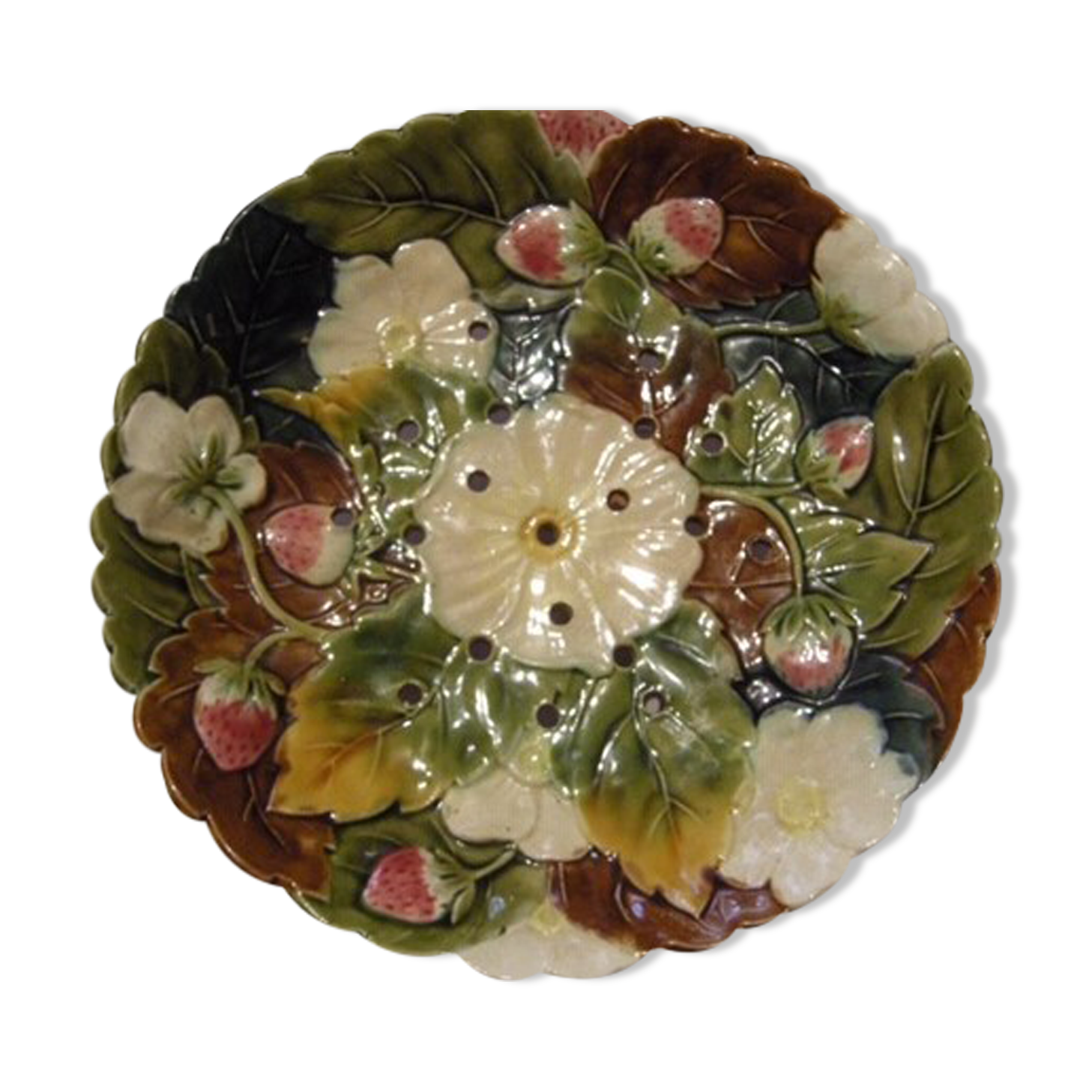 Barbotine decorating flat strawberry flowers