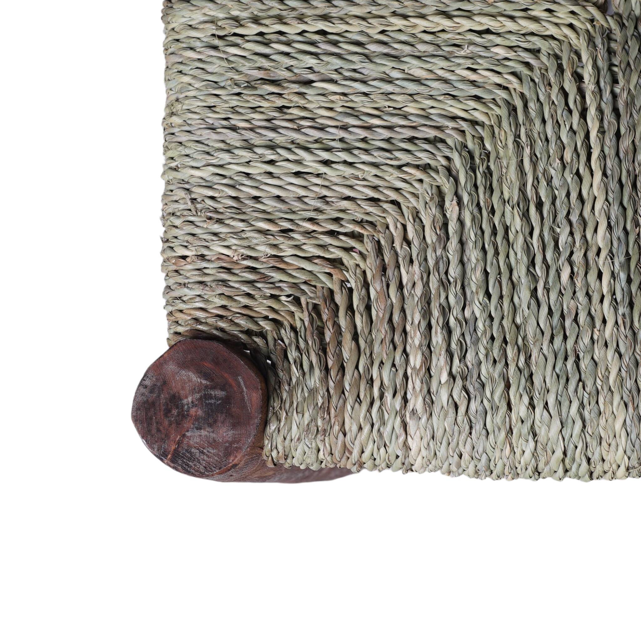 Wooden bench and woven rope