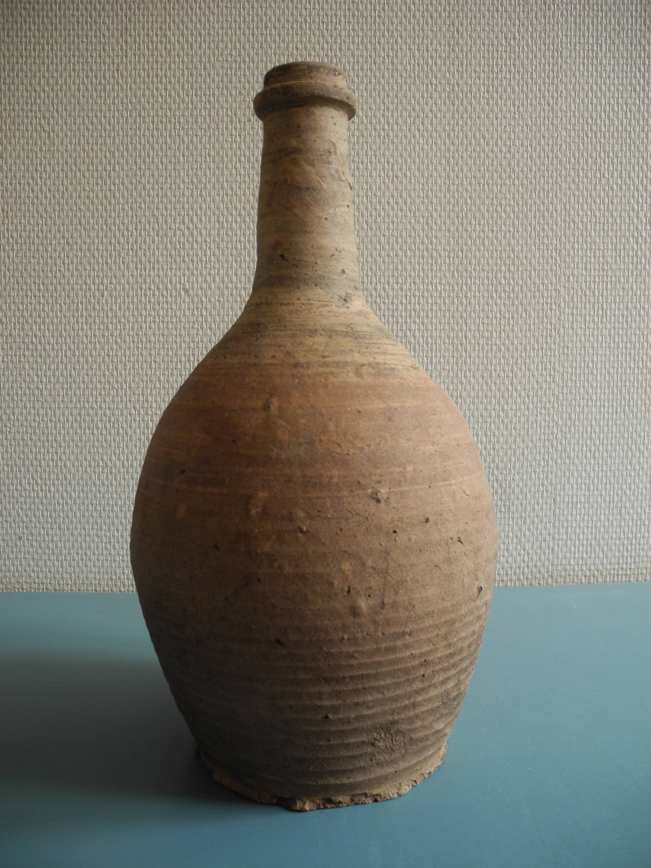antique rustic decorative terracotta pottery bottle