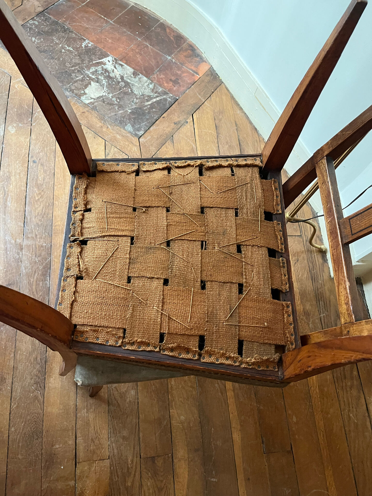Pair of Directoire chairs in walnut, late 18th century.