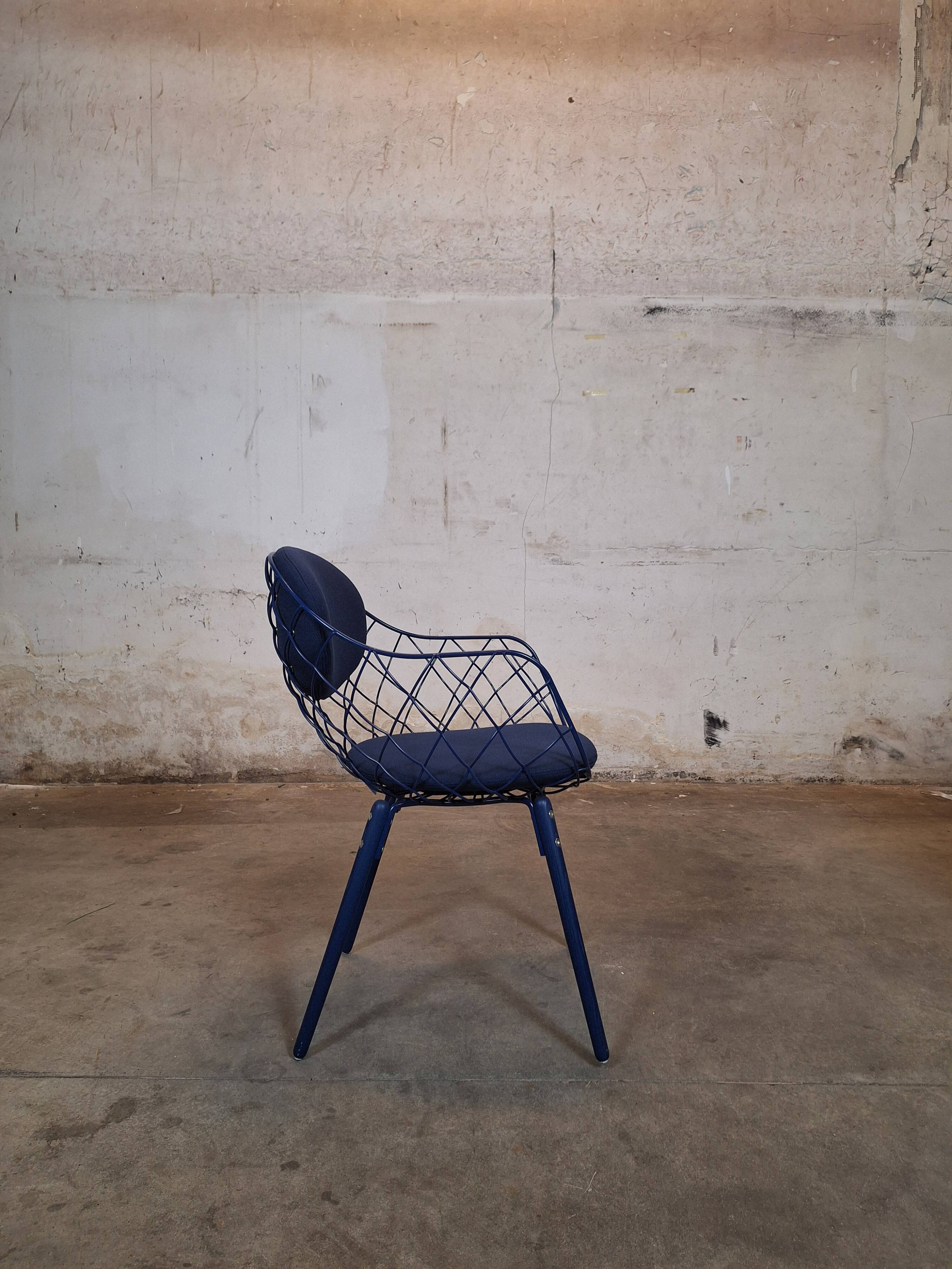 Magis Piña blue chair with metal frame and padded seat