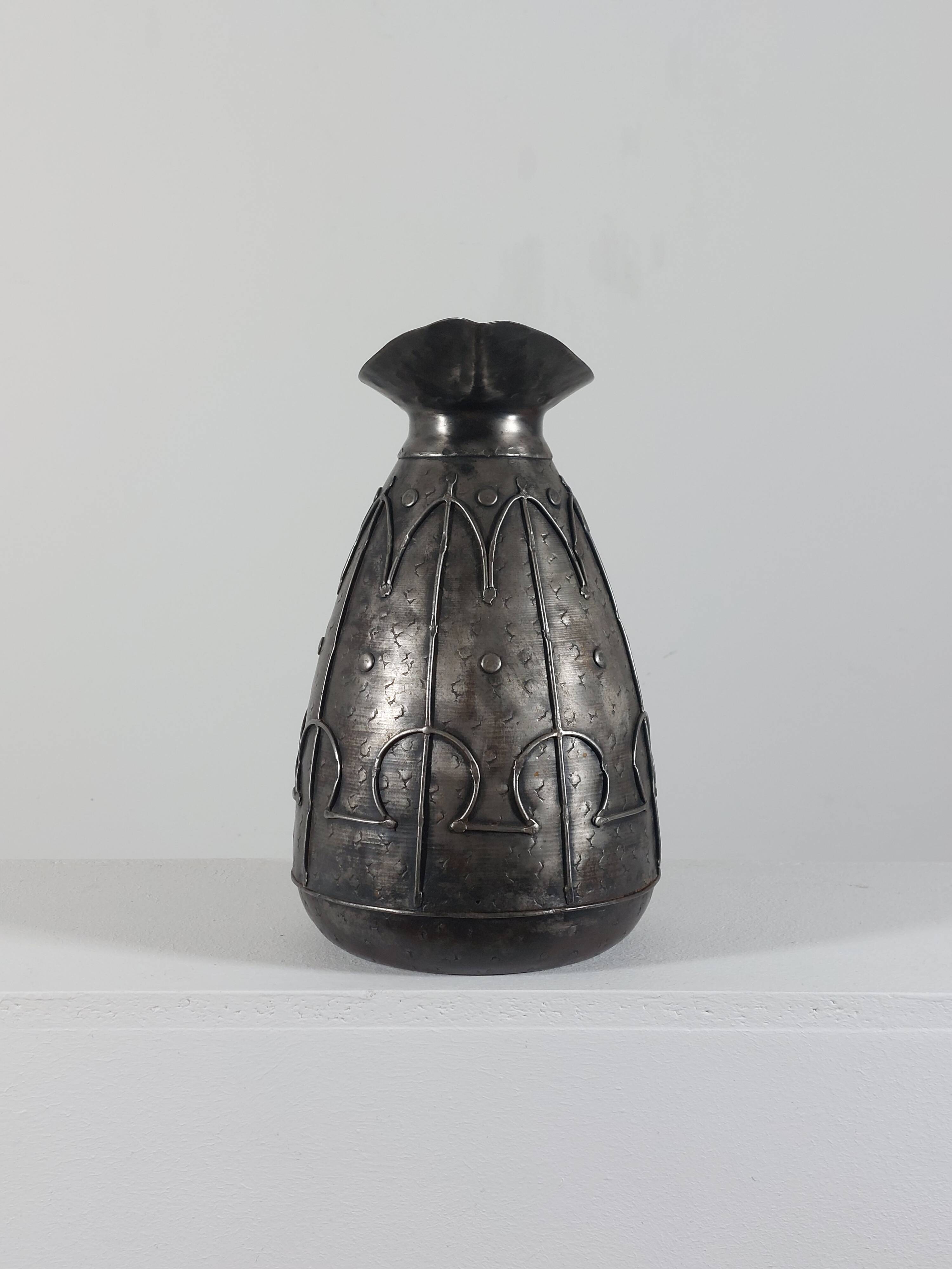 Rare hand-forged metal pitcher and craftsmanship from France.
