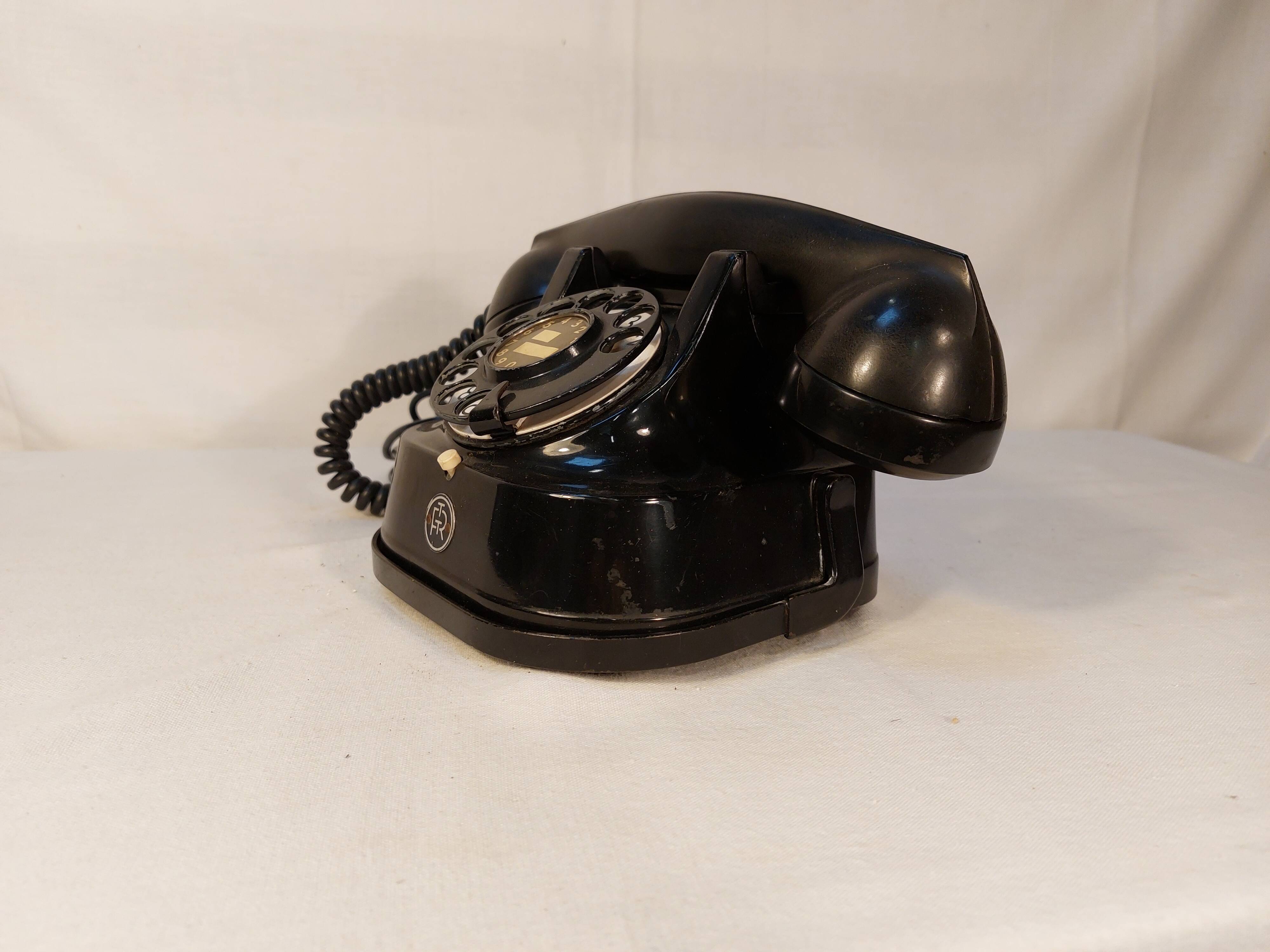 Old Belgian RTT 56B dial telephone in black bakelite