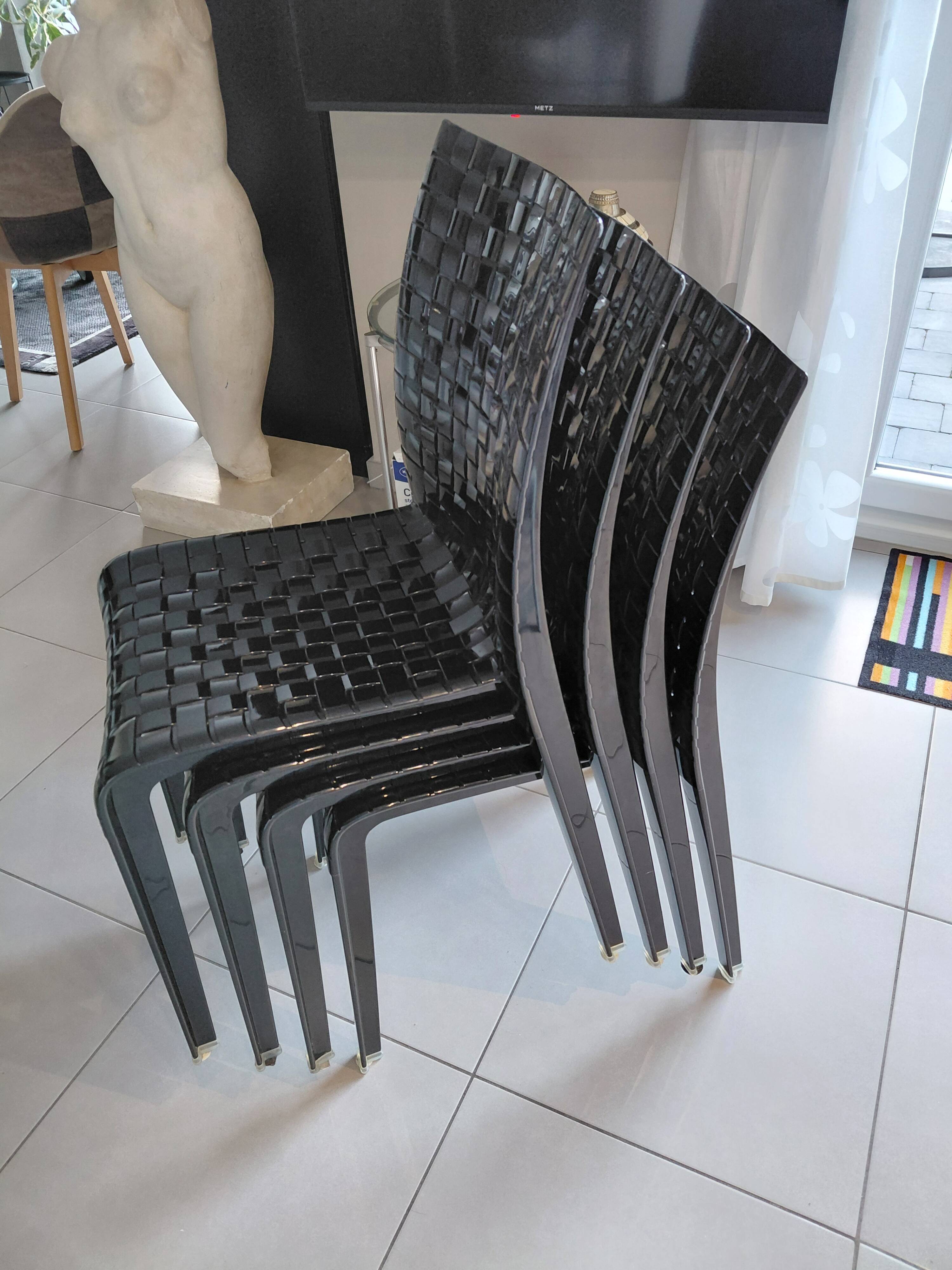 Kartell ami ami black chairs