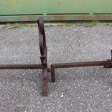 pair of andirons attributed to Raymond Subes, flame model