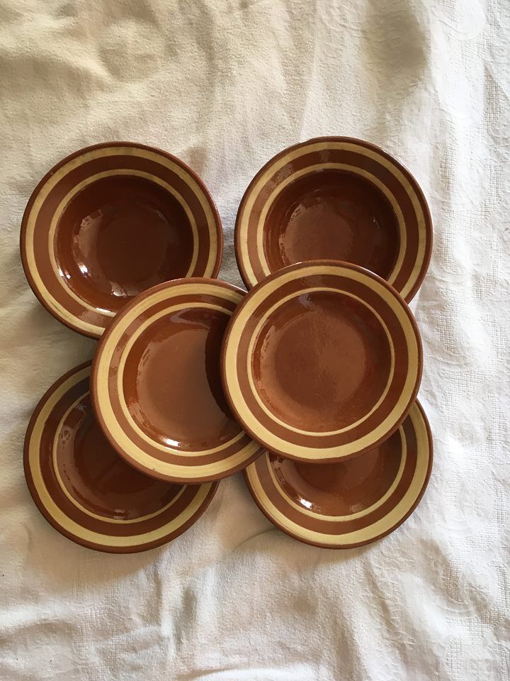Together six years 70 terracotta plates