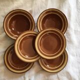 Together six years 70 terracotta plates
