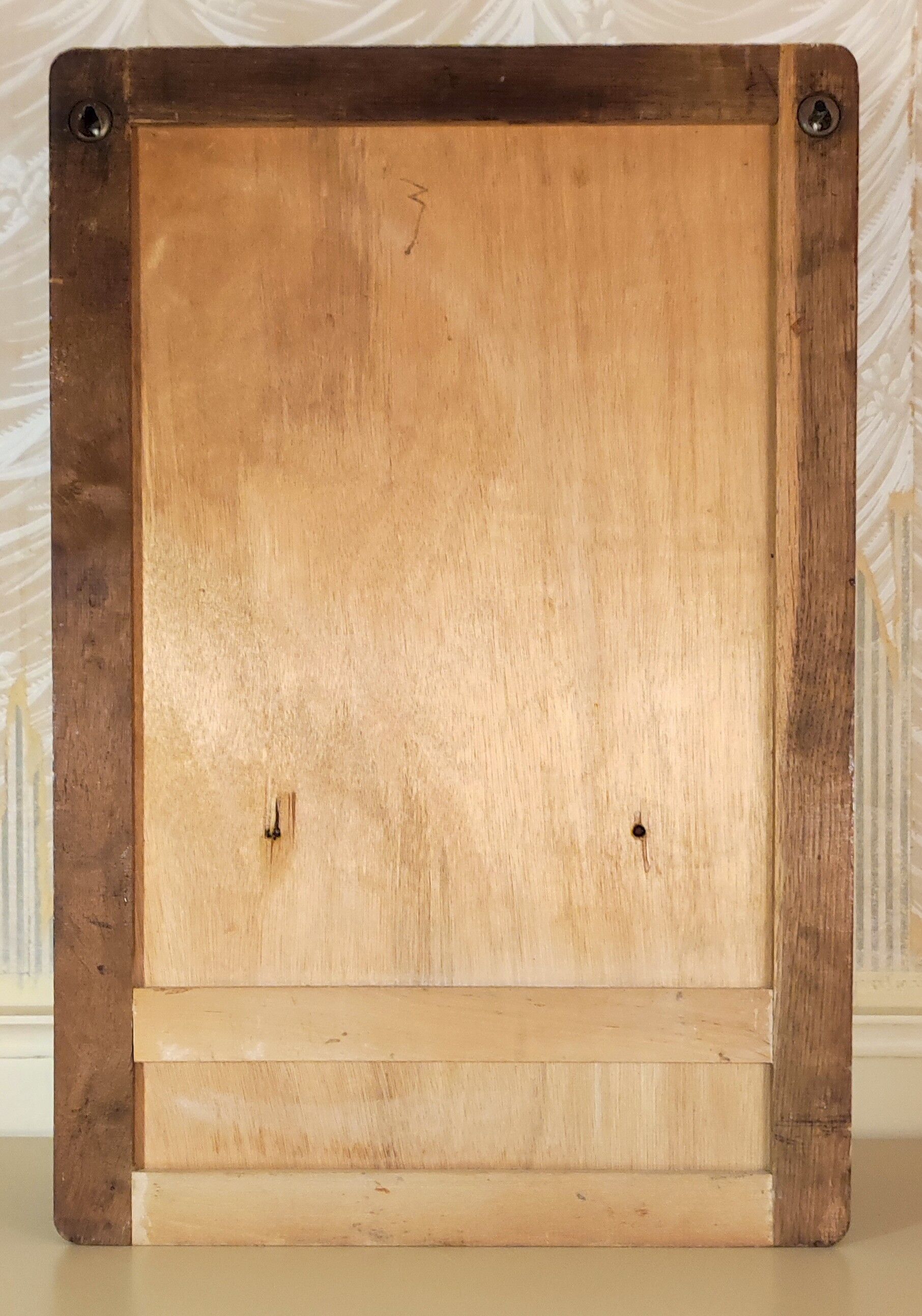 Wall-mounted medicine cabinet circa 1940