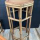 Trio of vintage rattan plant holders in the 60s