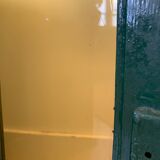 Wall vitrin with pediment