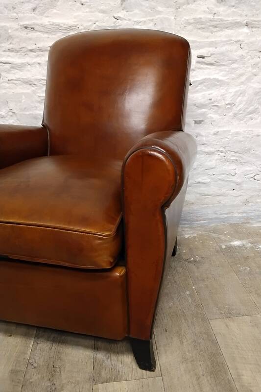 Restored horsehair club chair with curved back