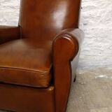 Restored horsehair club chair with curved back
