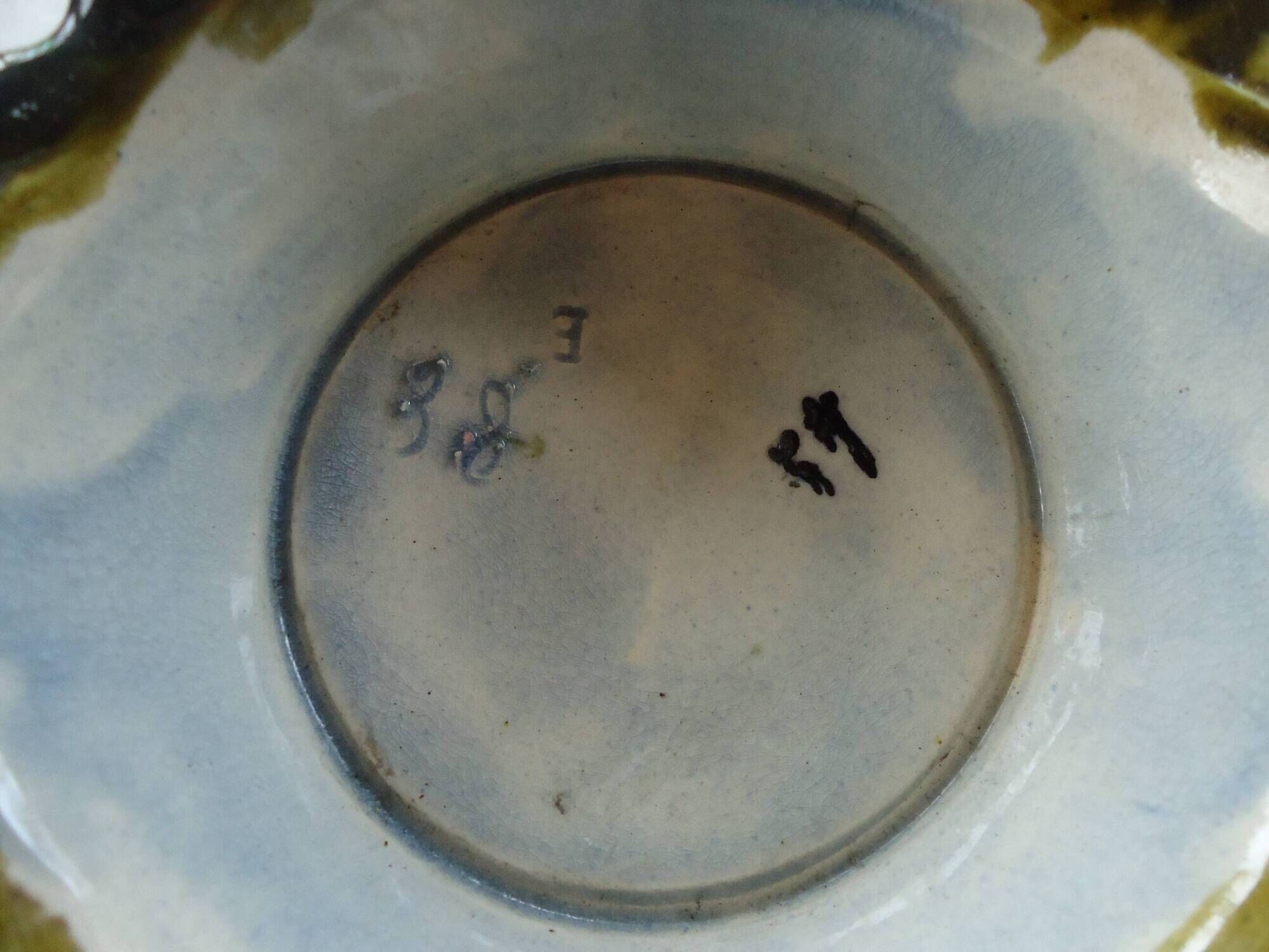 Pair of antique ceramic pot covers
