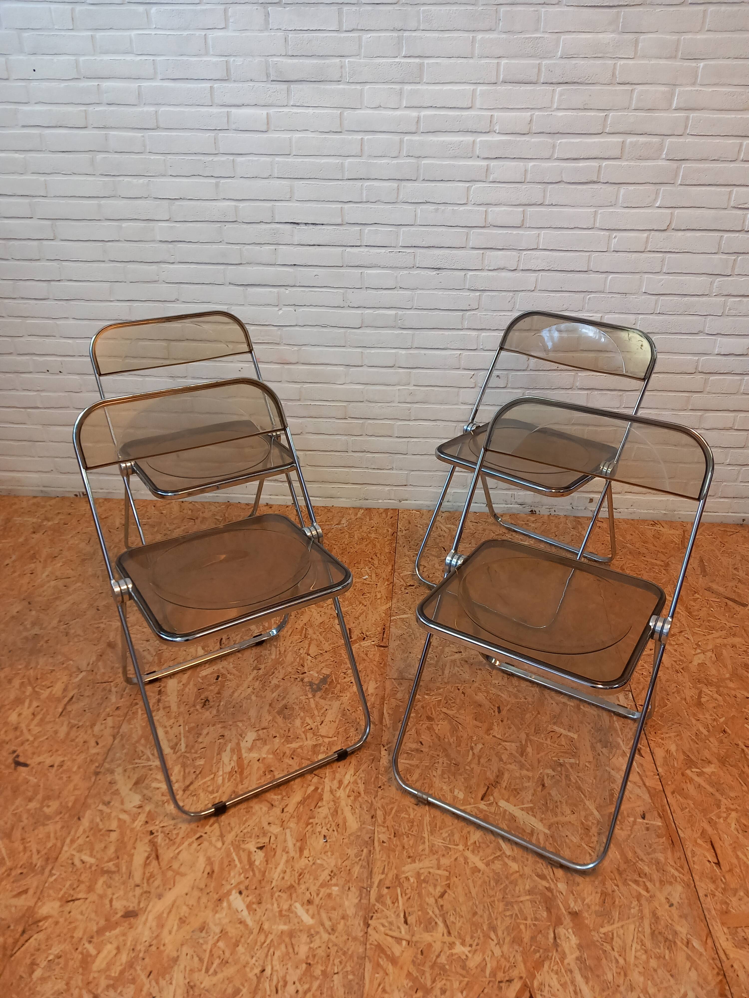 Set of 4 Plia chairs, Foldable chairs by Piretti