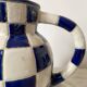 Antique blue and white checkered pitcher